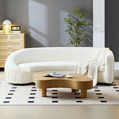 Asymmetric wraparound sofa